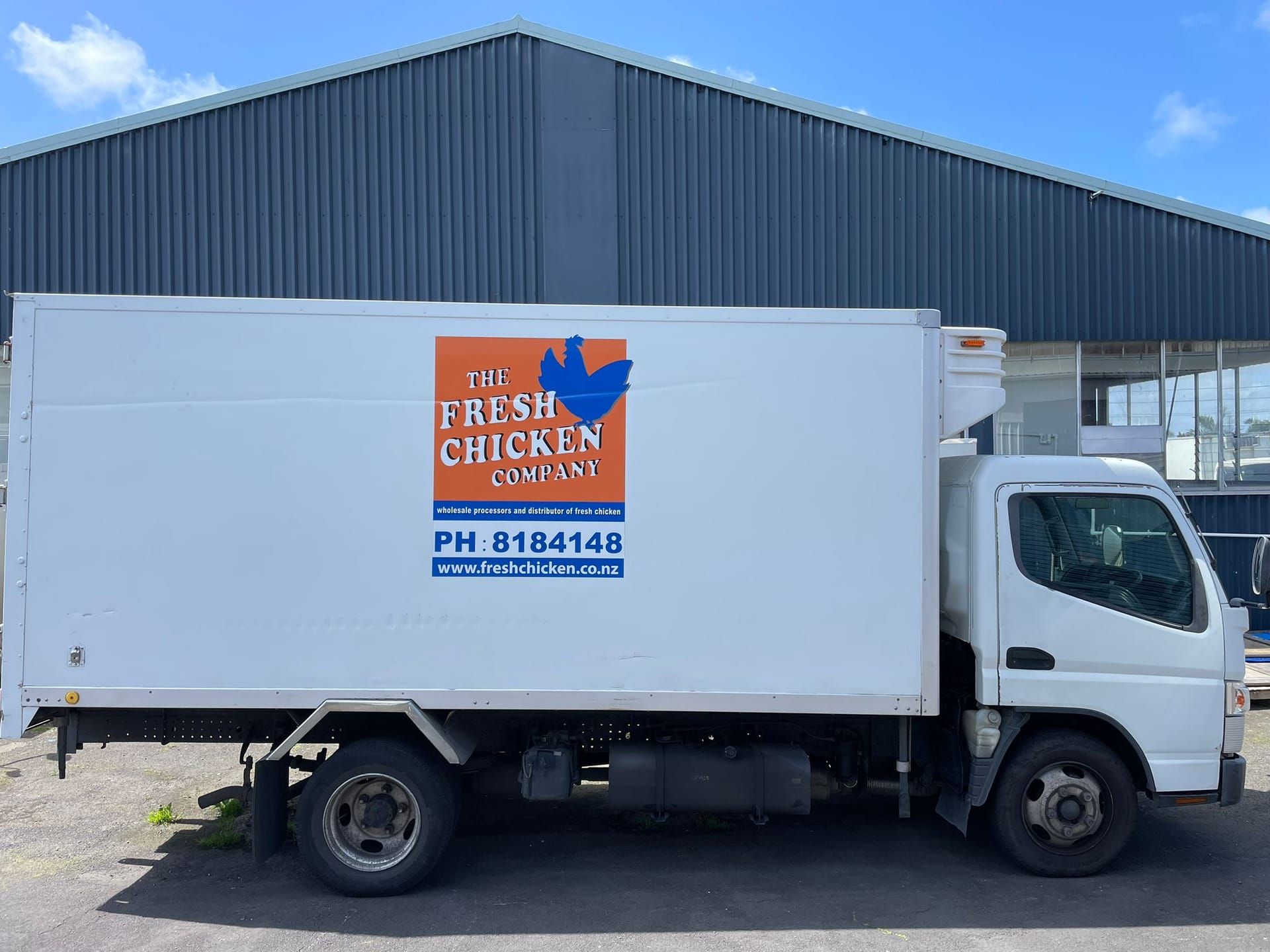 Fresh Chicken Company branded delivery truck